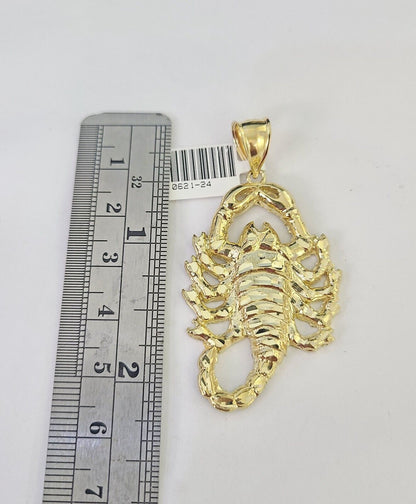 Full display of 10K yellow gold Franco chain with Scorpio pendant