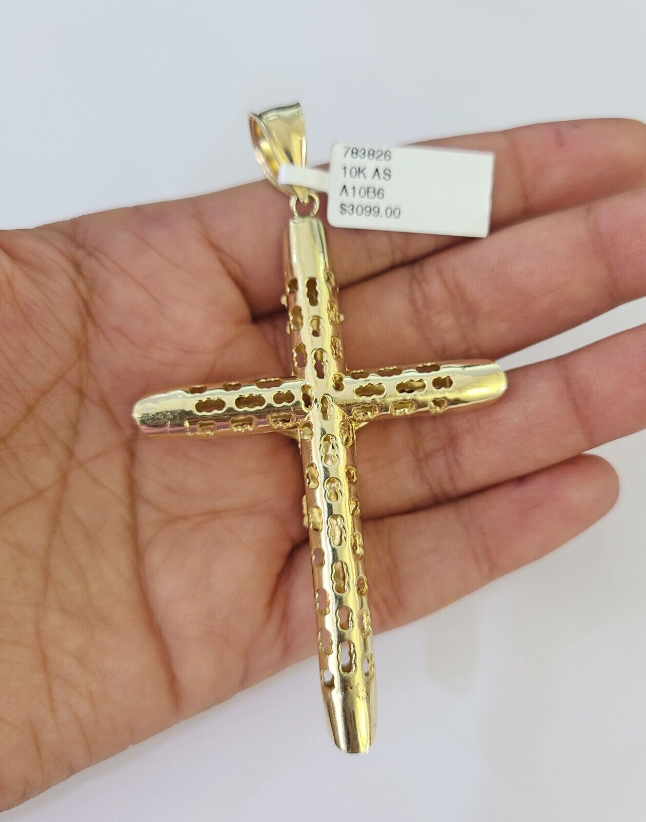 Detailed macro shot of 10K yellow gold Franco chain links