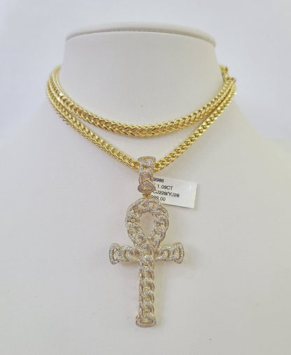 Front view of diamond-studded Jesus cross pendant necklace in 10K gold