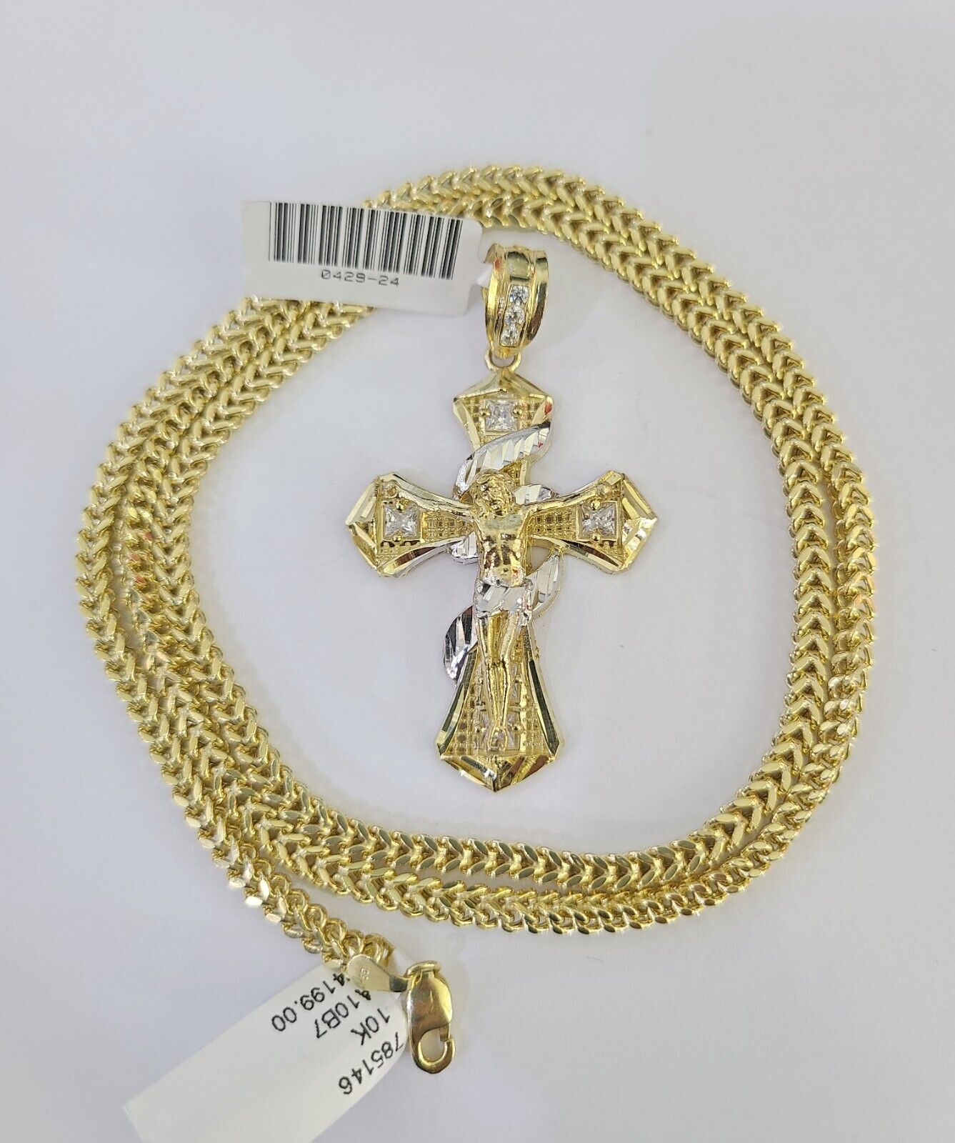 Luxury 10K gold Franco chain necklace with Jesus cross pendant by Reva Jeweler