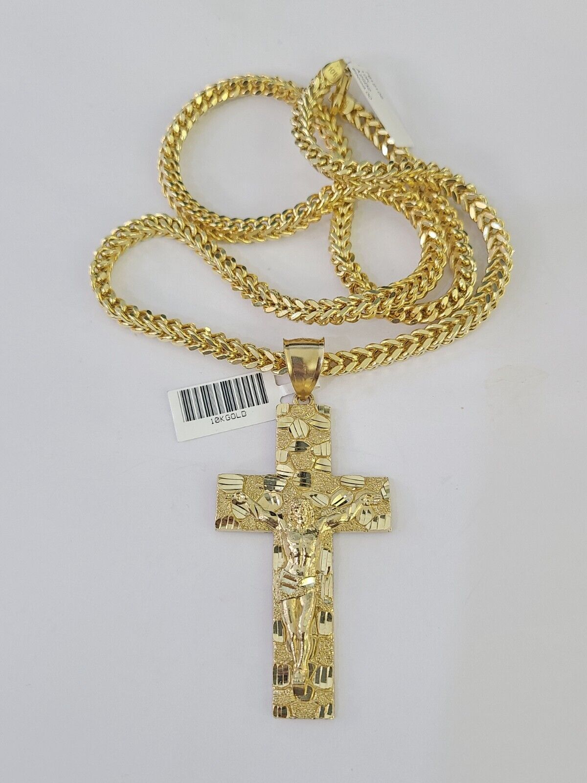 Polished 10K gold Jesus cross pendant necklace with chain links