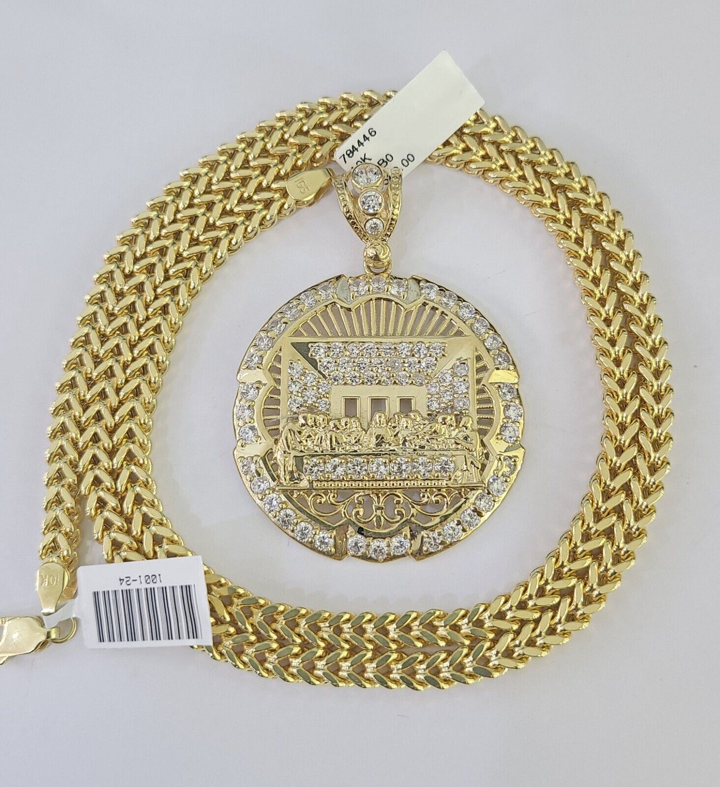 Detailed macro shot of 10K yellow gold Franco chain links