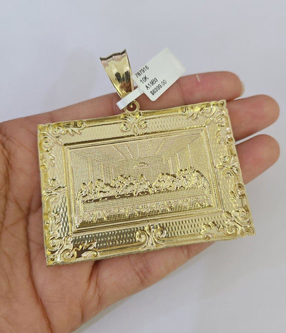 Side angle view of 10K yellow gold Last Supper pendant on Franco chain