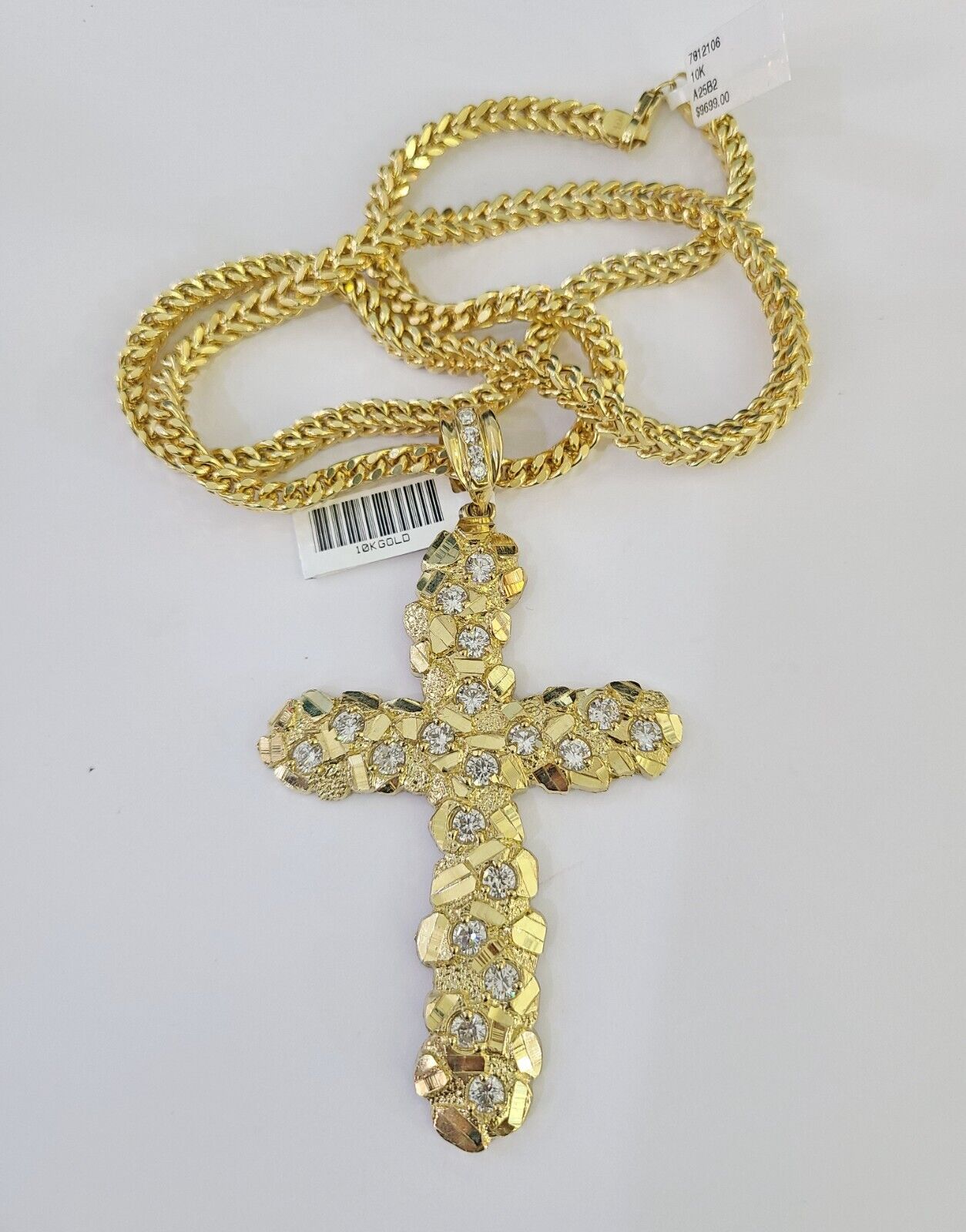 Detailed macro shot of 10K yellow gold Franco chain links