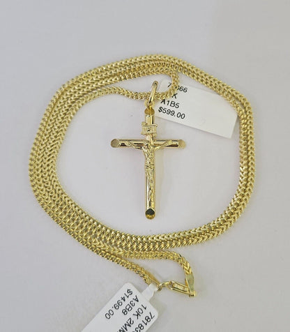Front view of INRI Jesus cross pendant necklace in 10K gold with Franco chain
