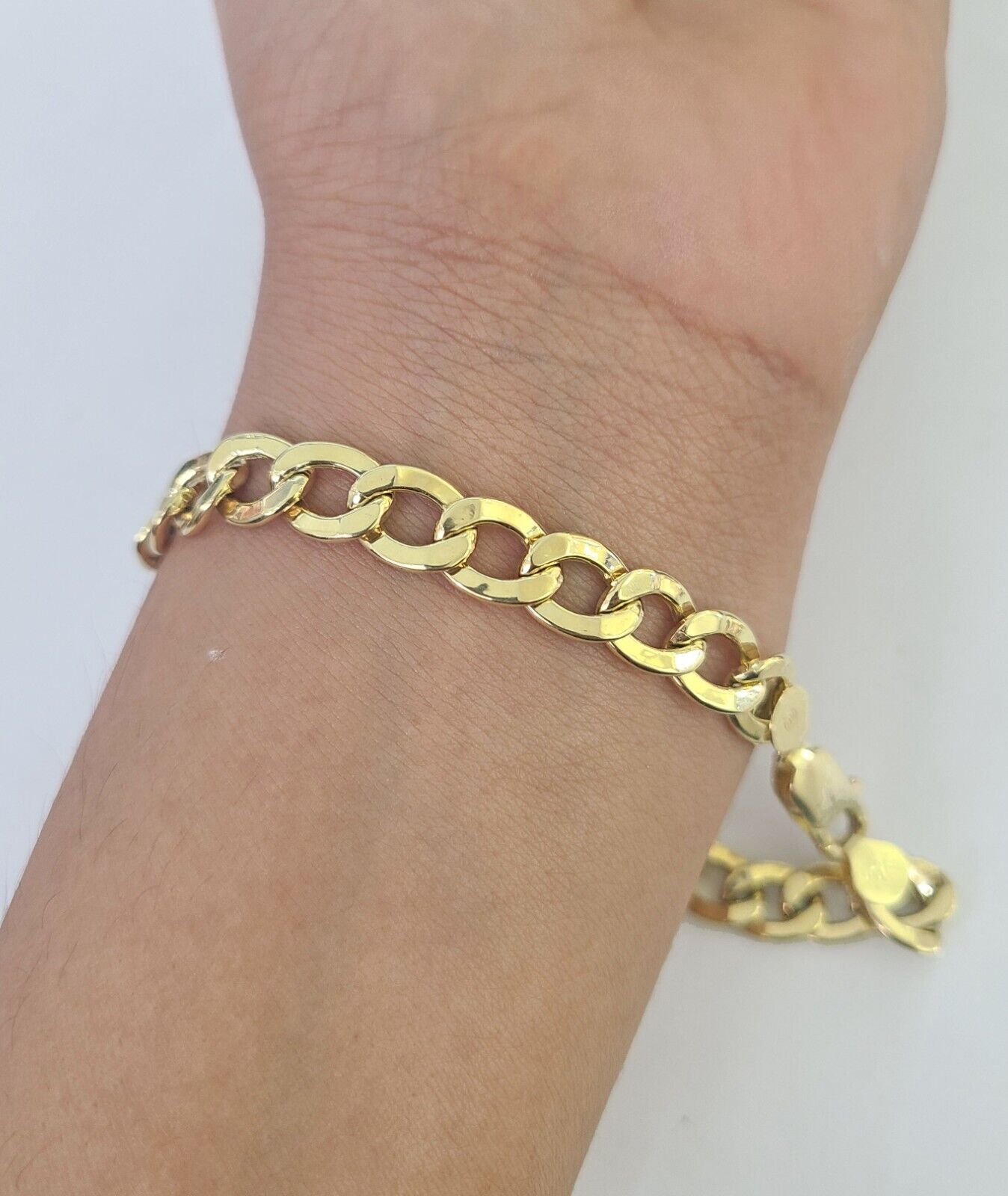 Secure lobster clasp on 10K Yellow Gold Cuban Link ID Bracelet