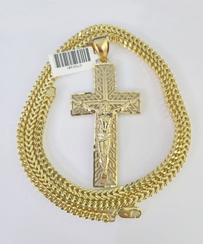 Front-facing view of Reva Jeweler 10K gold crucifix cross pendant and chain