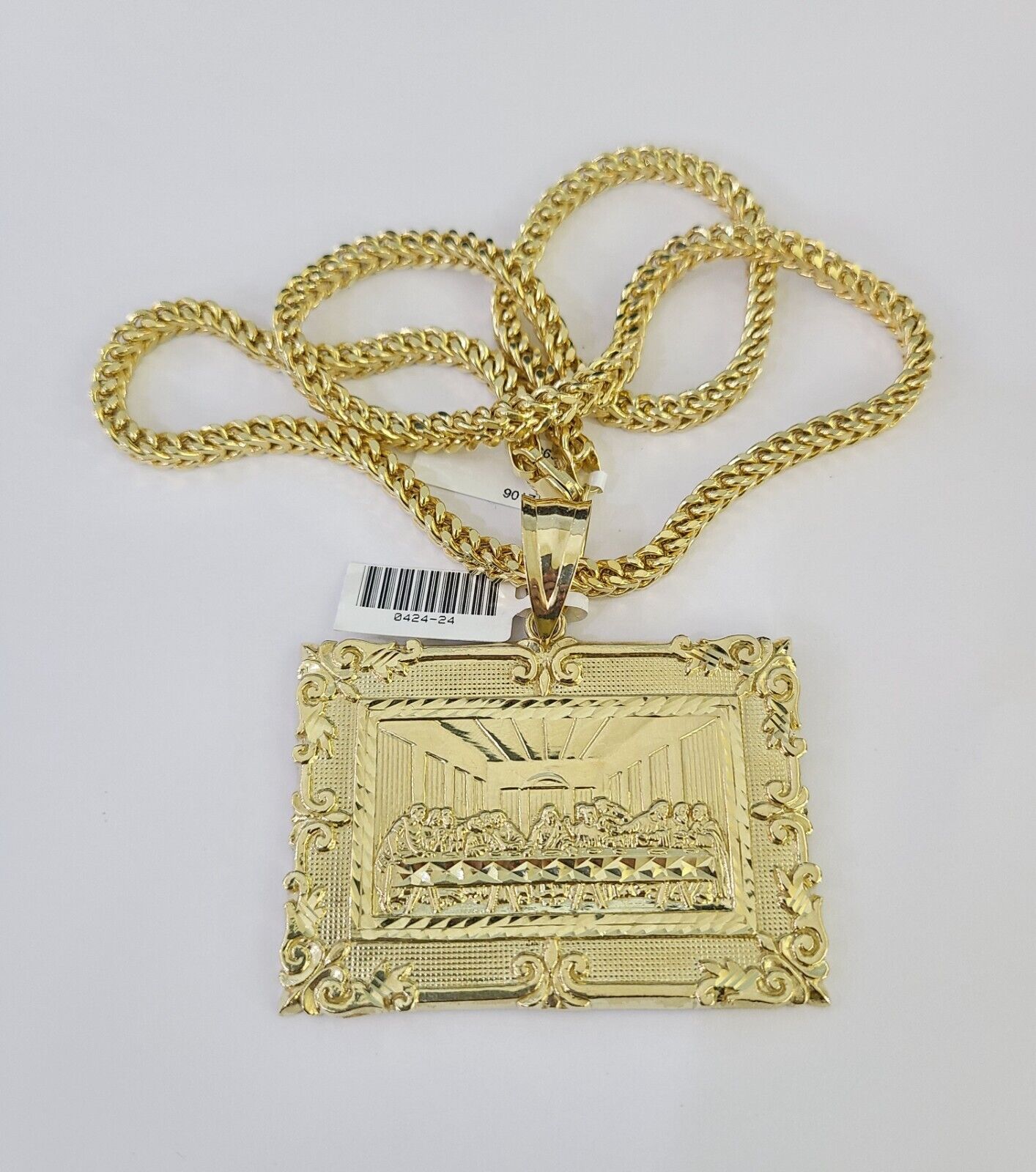 Close-up detailed view of 10K yellow gold Last Supper pendant charm