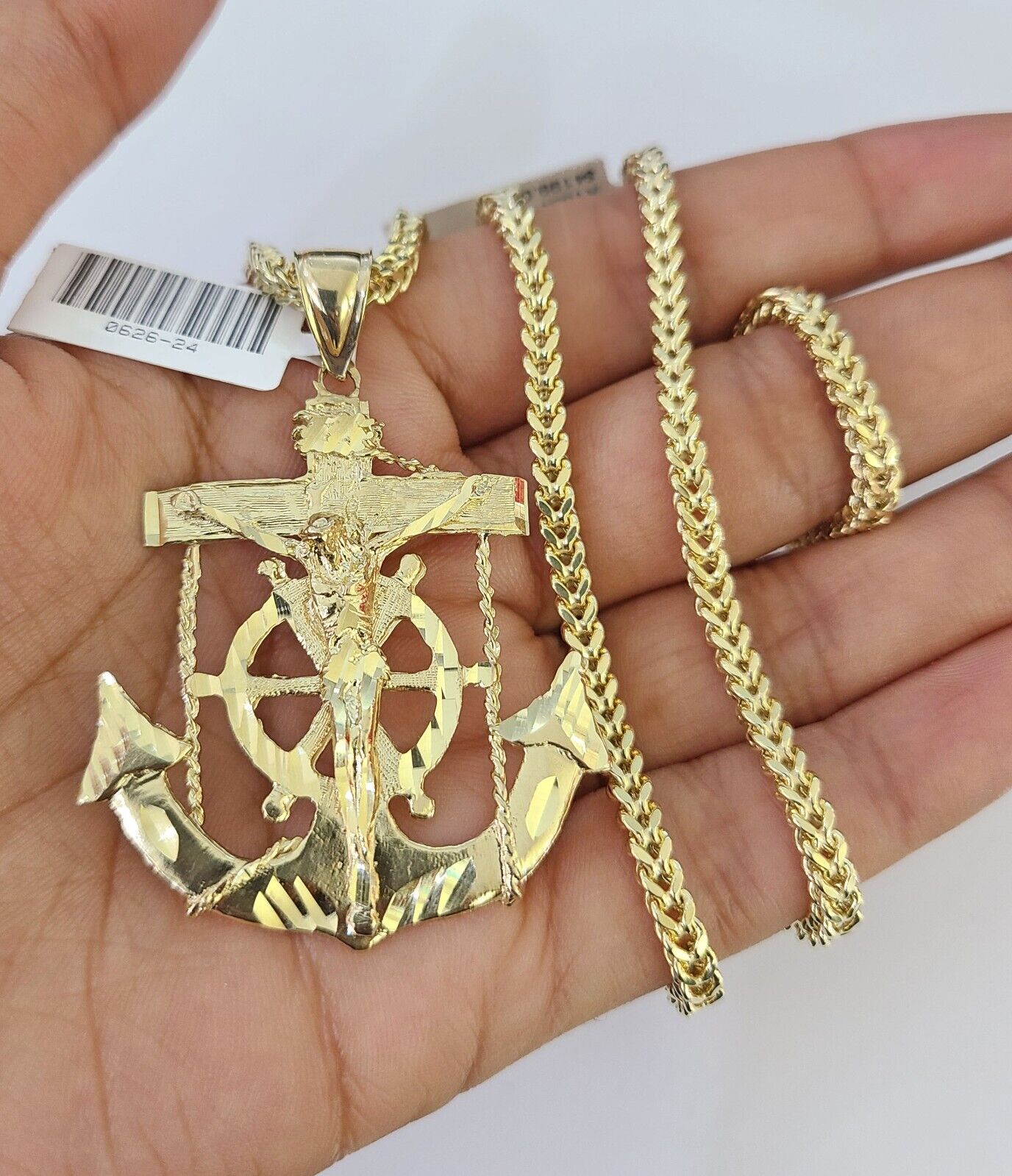 Front view of Jesus anchor pendant necklace in 10K gold with Franco chain