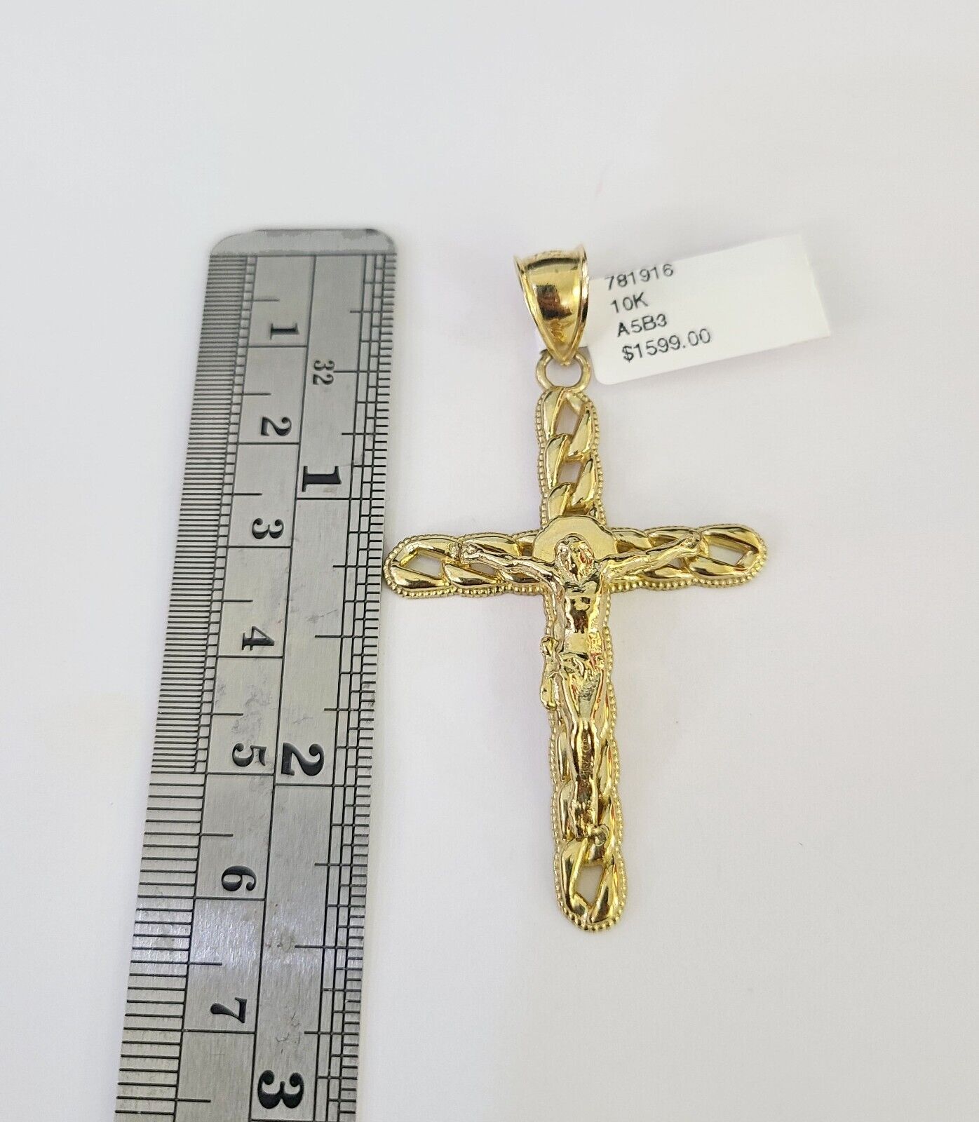 Luxury 10K gold Franco chain necklace with Jesus cross pendant by Reva Jeweler