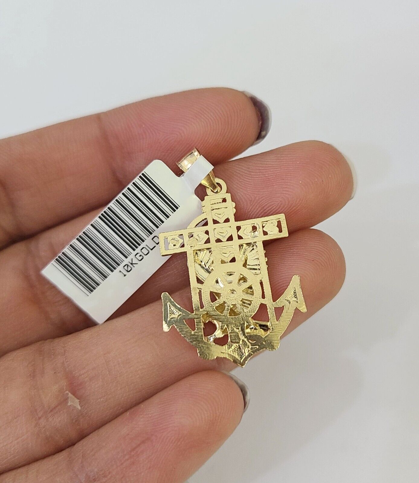 Close-up of 10K yellow gold eagle anchor pendant on Franco chain