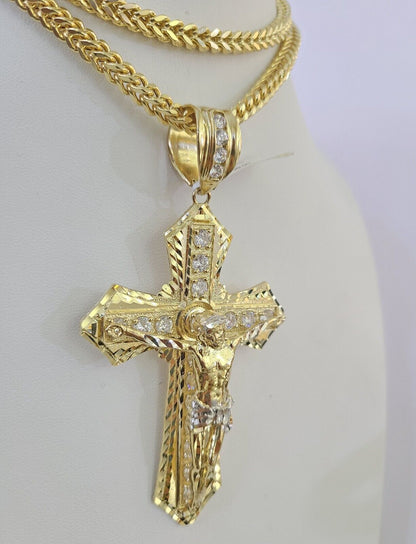 Full set display of the 10K yellow gold Franco chain and Jesus cross pendant