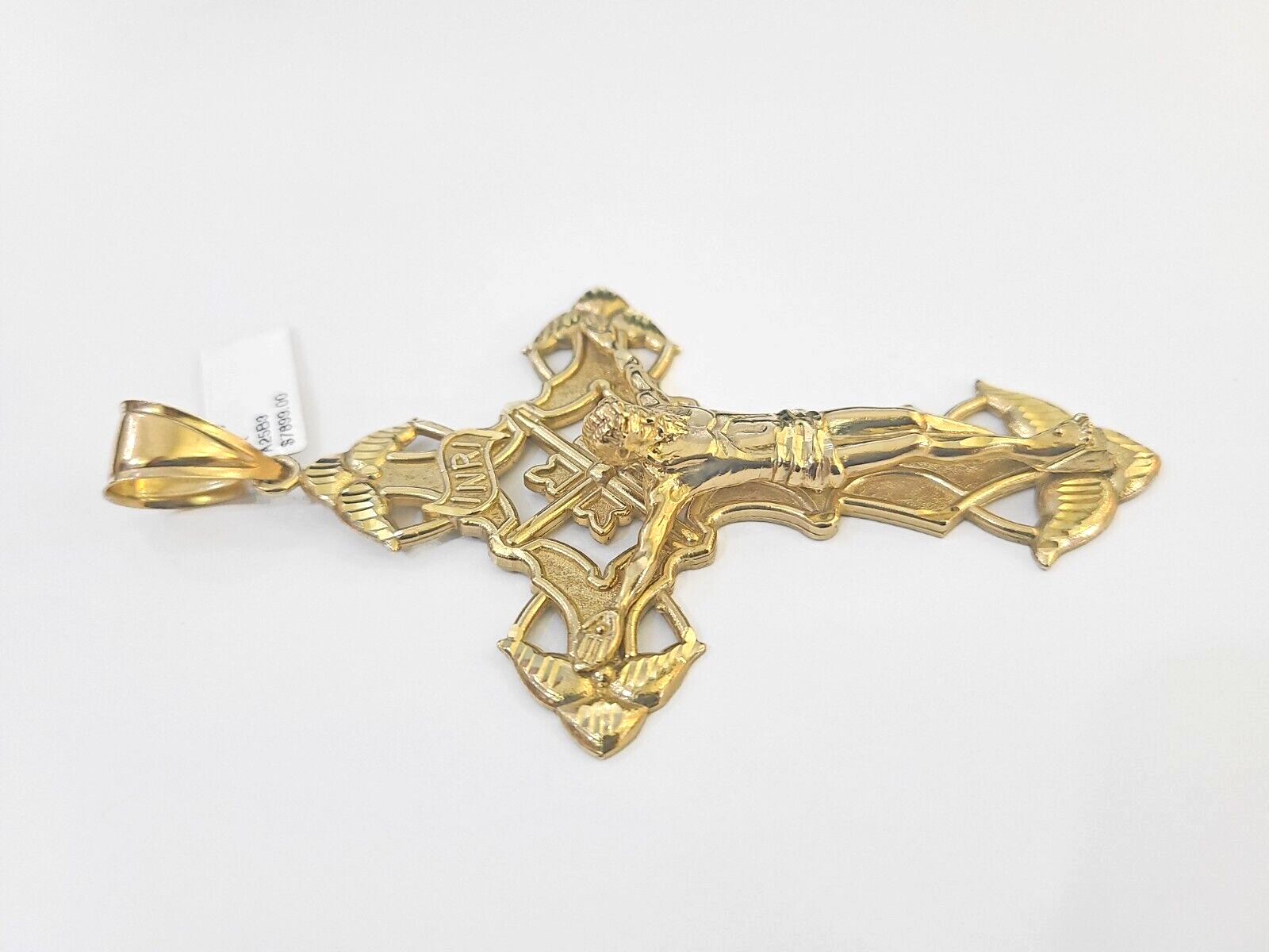 10K Yellow Gold Crucifix Cross Pendant with Jesus Christ Charm for Men and Women by Reva Jeweler