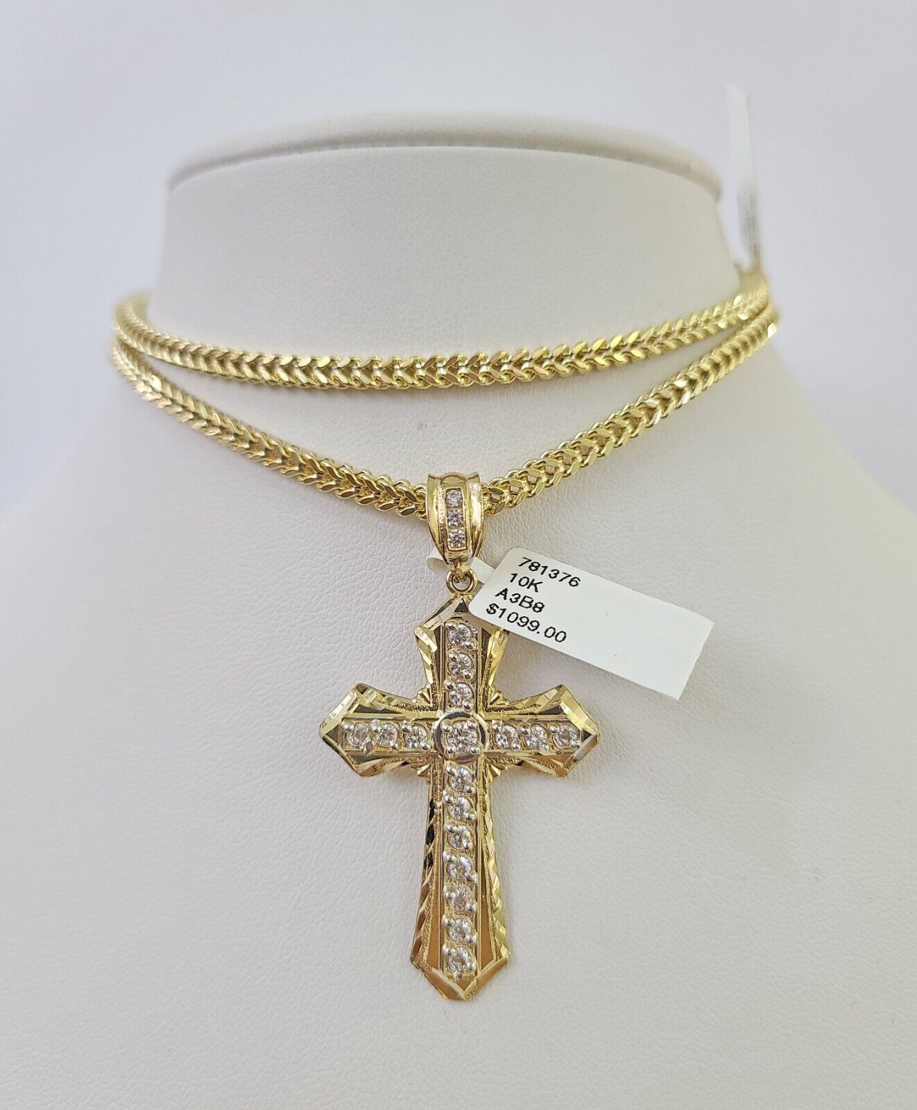 Side angle view of Franco chain necklace featuring Jesus cross pendant charm