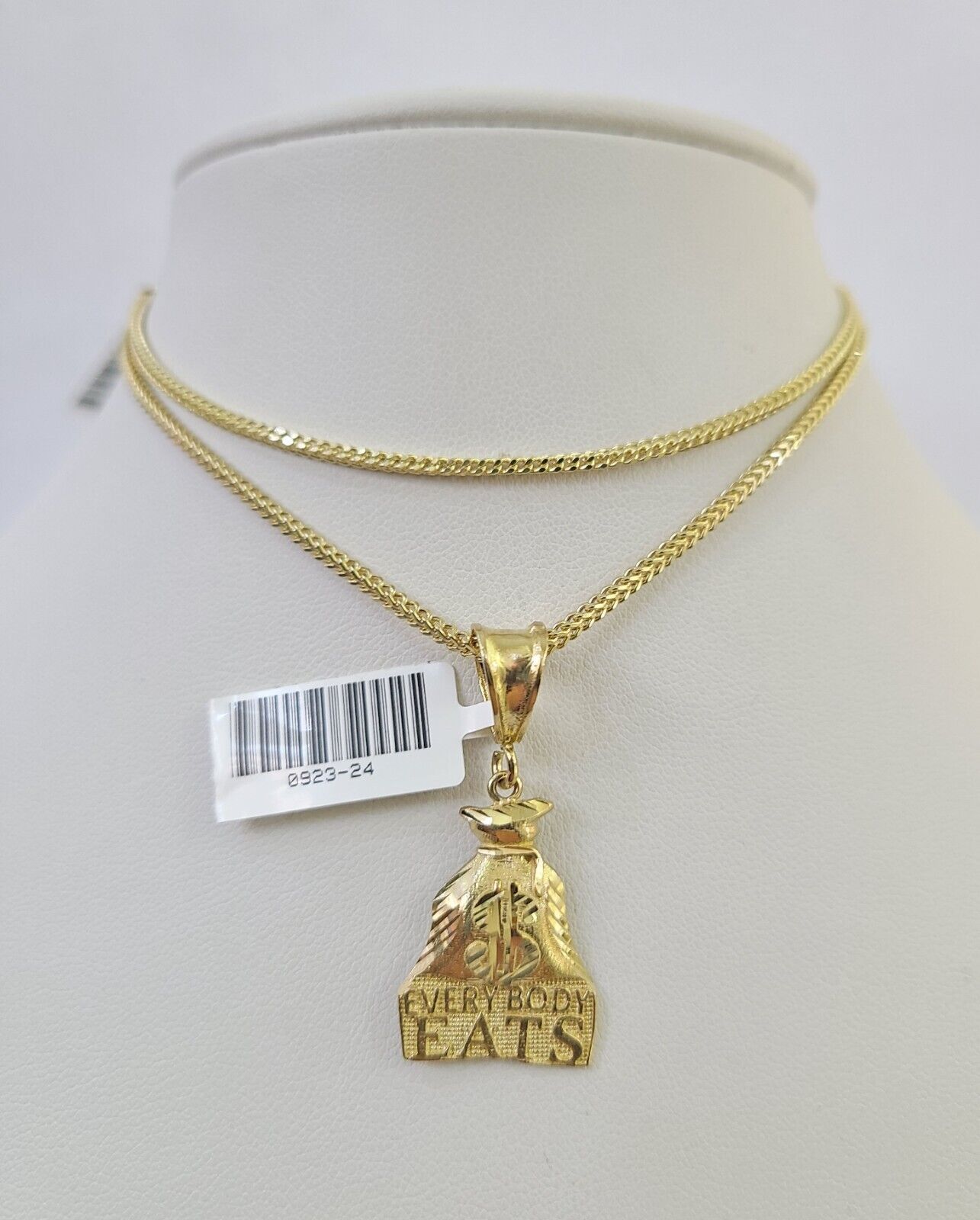 Polished 10K gold statement pendant necklace with Franco chain links