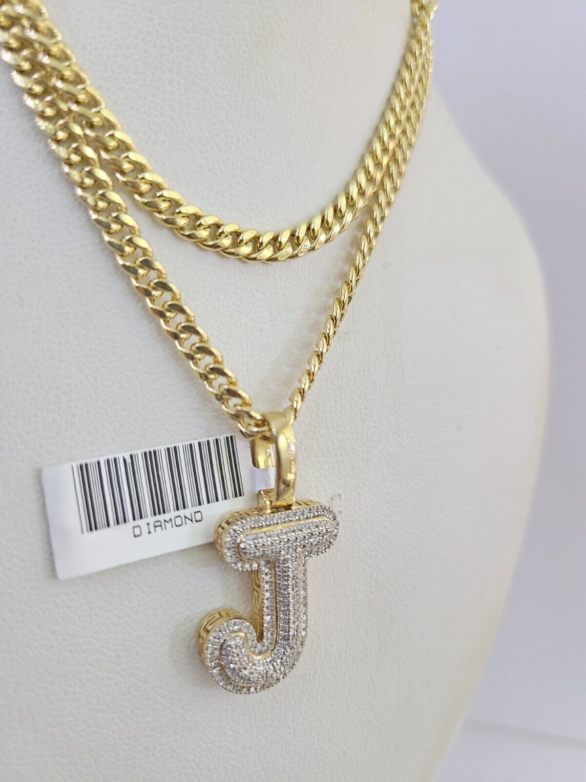 J initial chain set flat lay