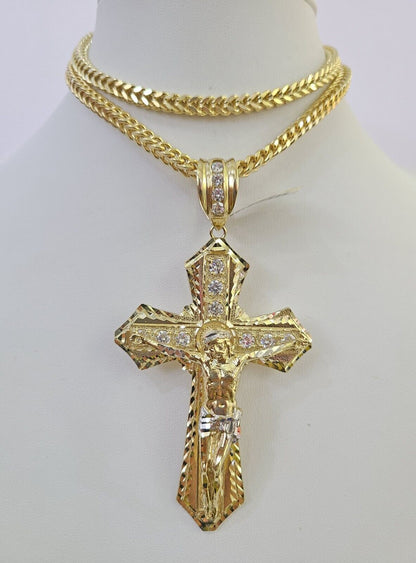Close-up detailed view of the 10K yellow gold Jesus cross charm