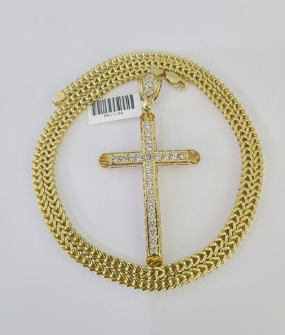 Side angle view of 10K yellow gold Jesus cross pendant on Franco chain
