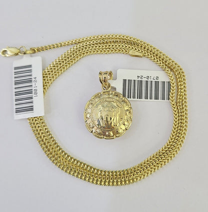 Side angle view of 10K yellow gold Jesus and Mary pendant on Franco chain