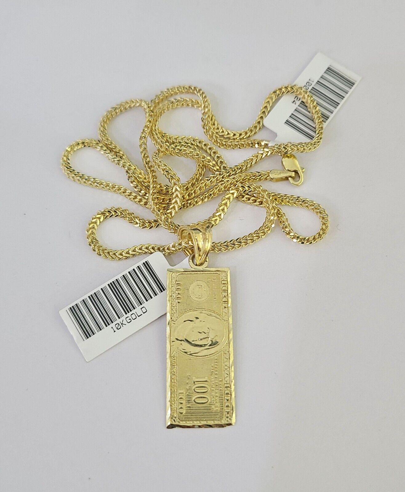 Detailed 10K gold money pendant charm necklace with Franco chain links