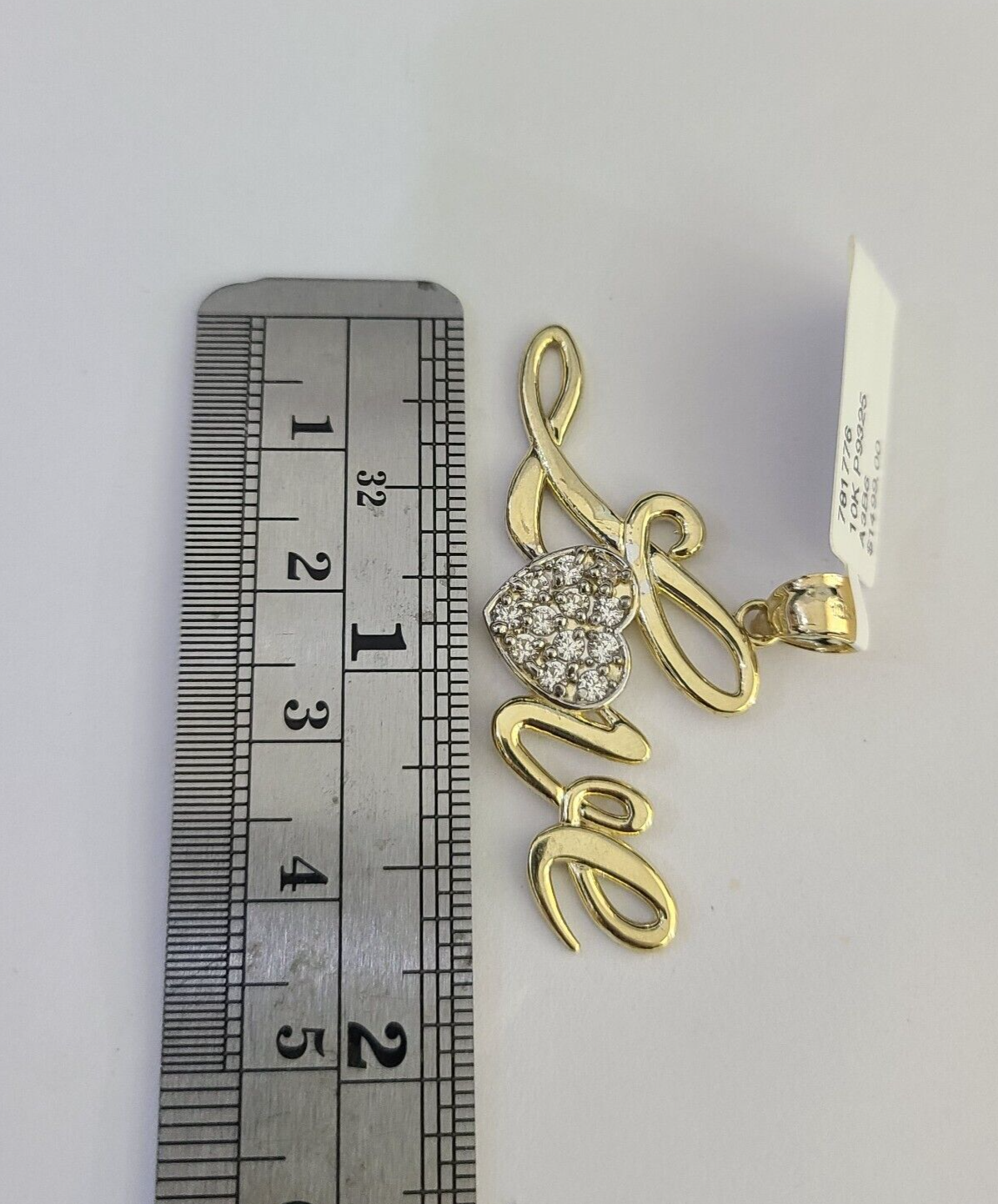 10k gold LOVE pendant lettering detail