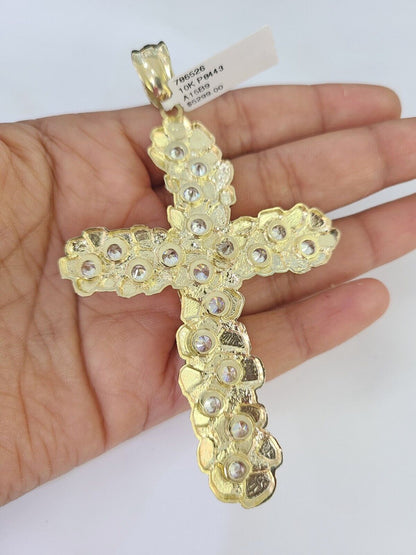 Lifestyle or alternate angle view of 10K gold crucifix necklace by Reva Jeweler
