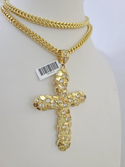 Full display of 10K yellow gold Franco chain with Jesus cross pendant