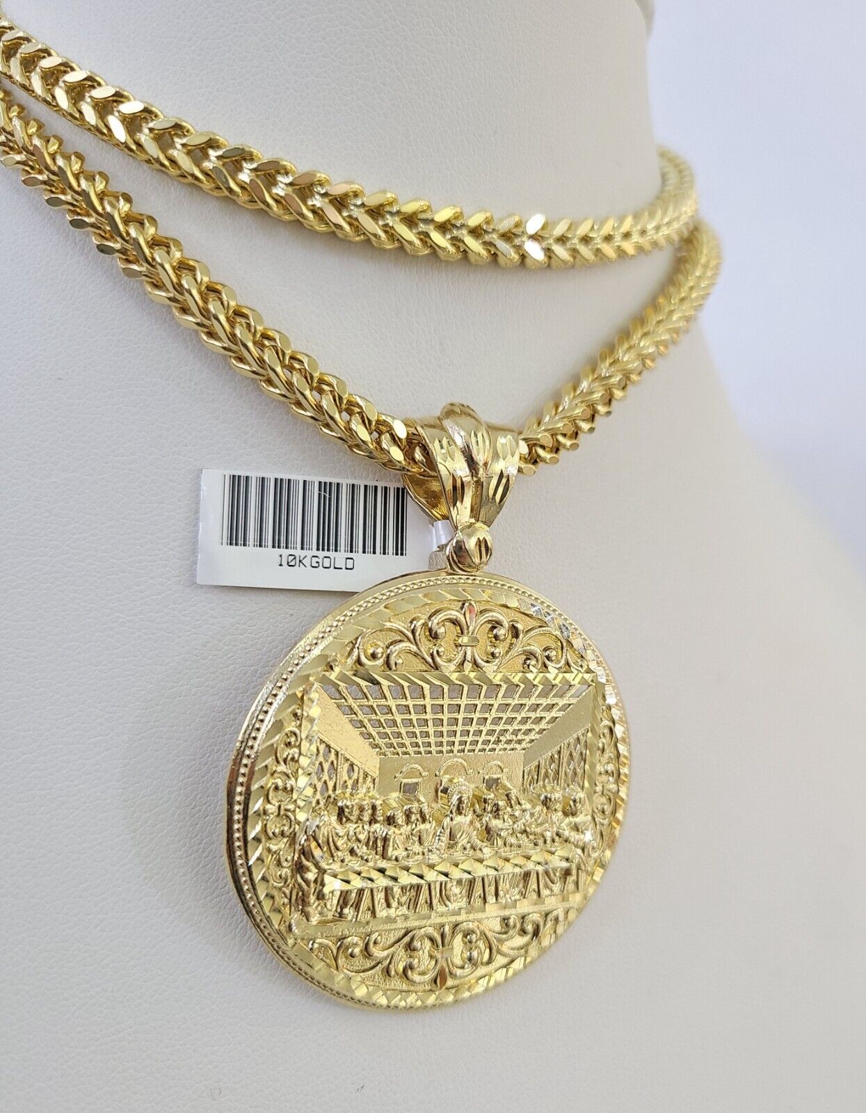 Front-facing view of Reva Jeweler 10K gold Last Supper pendant and chain