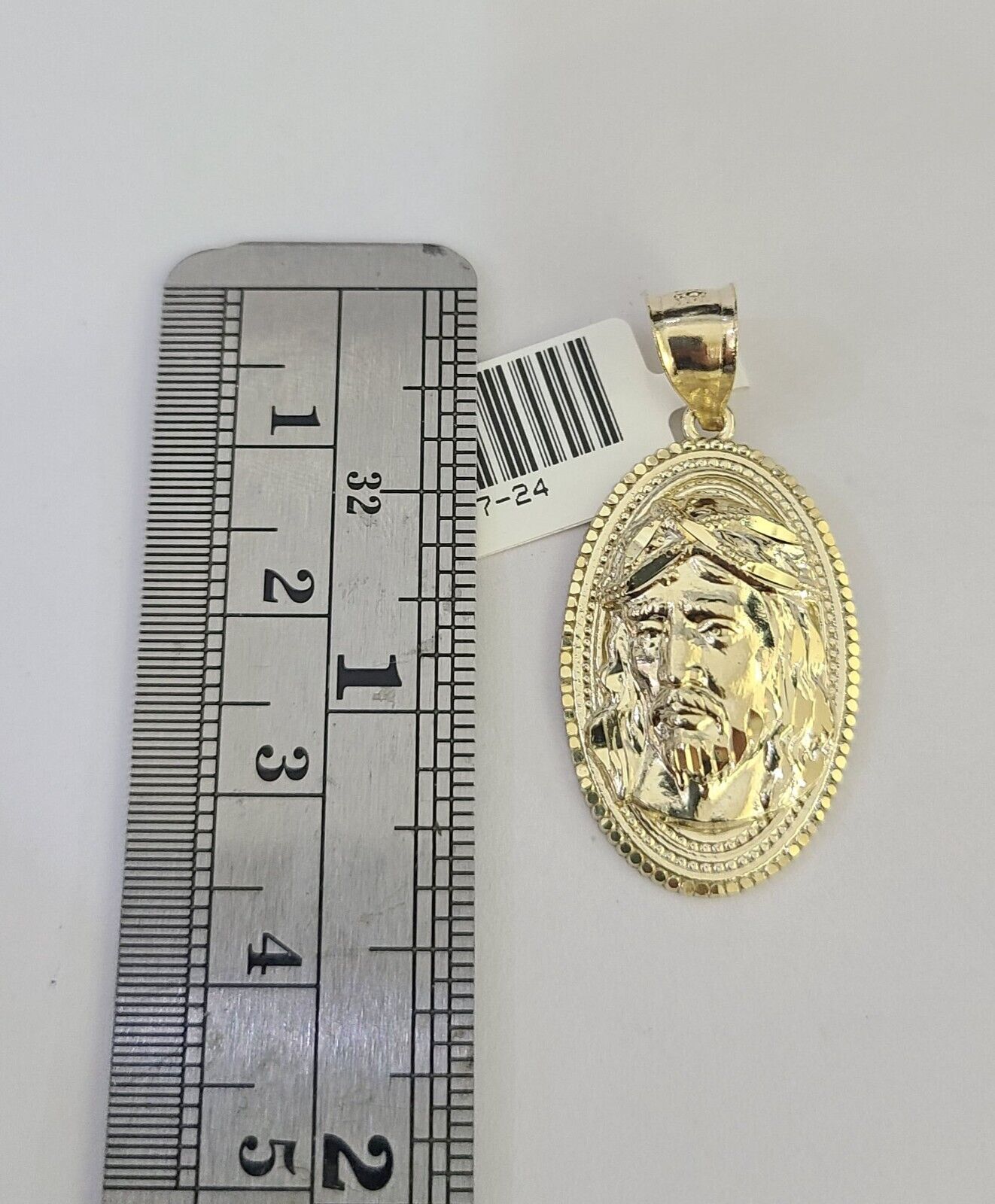 10K yellow gold Jesus head pendant and Franco chain necklace set by Reva Jeweler