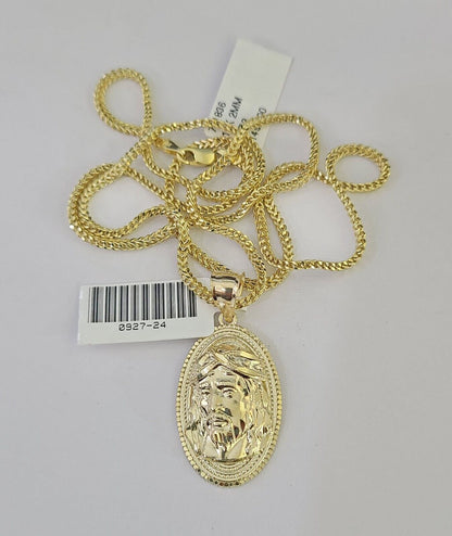 Lifestyle or alternate angle view of 10K gold Jesus head necklace by Reva Jeweler