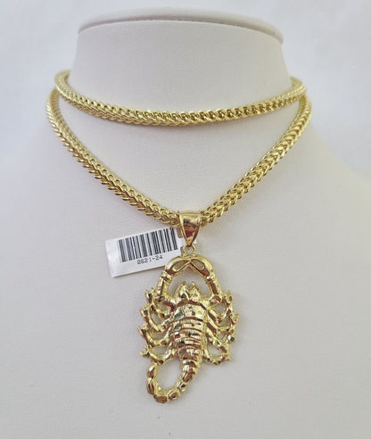 10K yellow gold Scorpio pendant and Franco chain necklace set by Reva Jeweler