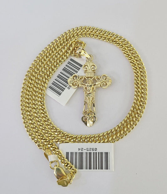 Angled gold INRI cross