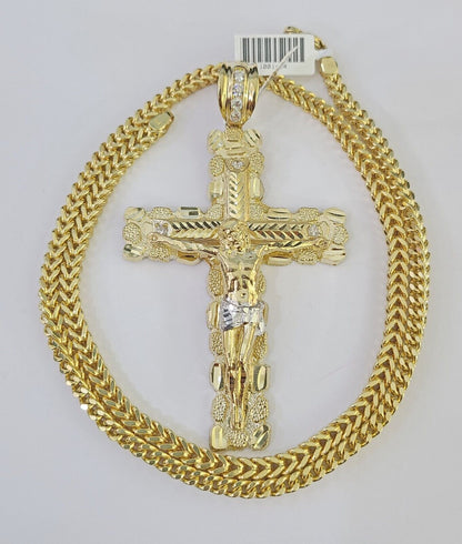 Flat lay display of Reva Jeweler 10K yellow gold necklace set