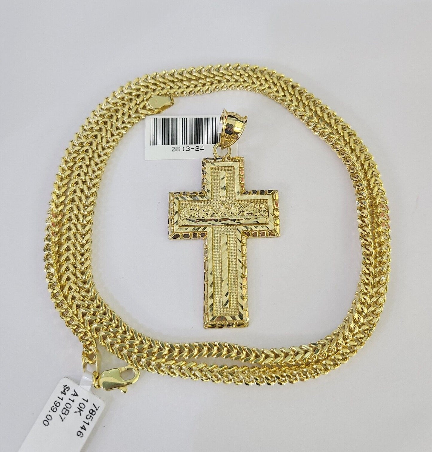 Full display of 10K yellow gold Franco chain with Last Supper cross pendant