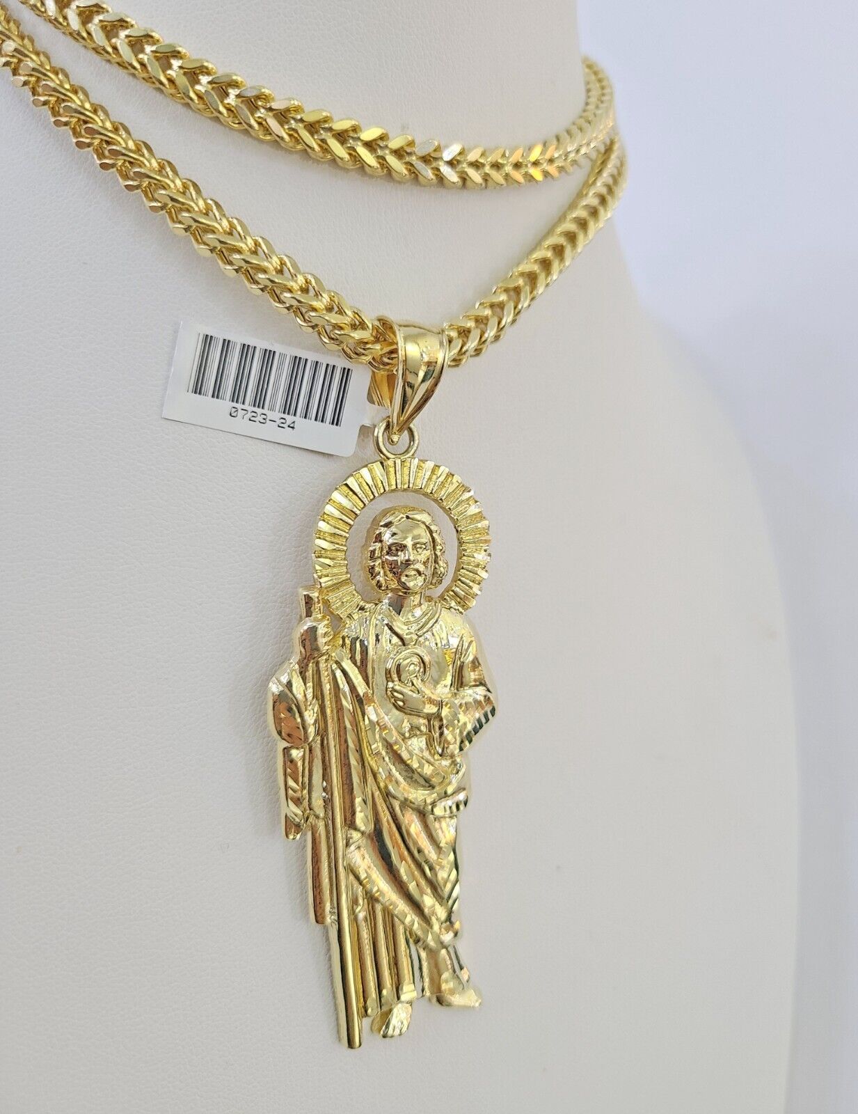 Side angle view of 10K yellow gold Saint Jude pendant on Franco chain