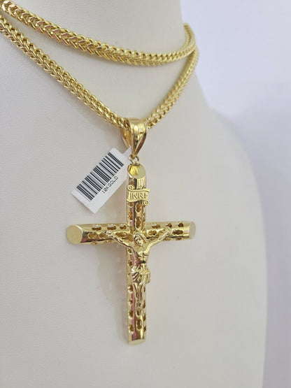 Front-facing view of Reva Jeweler 10K gold INRI cross pendant and chain