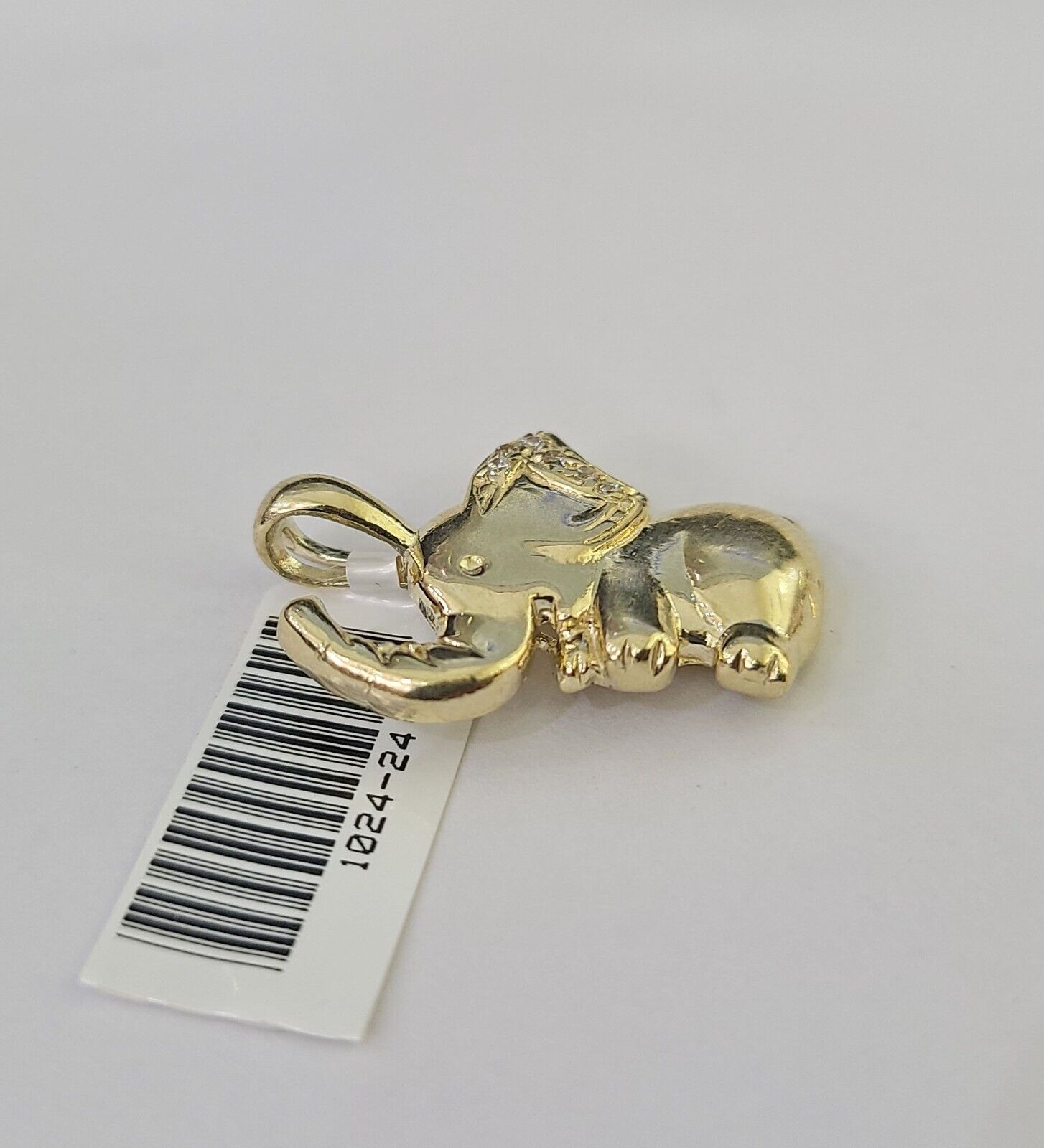 Side view of elephant pendant