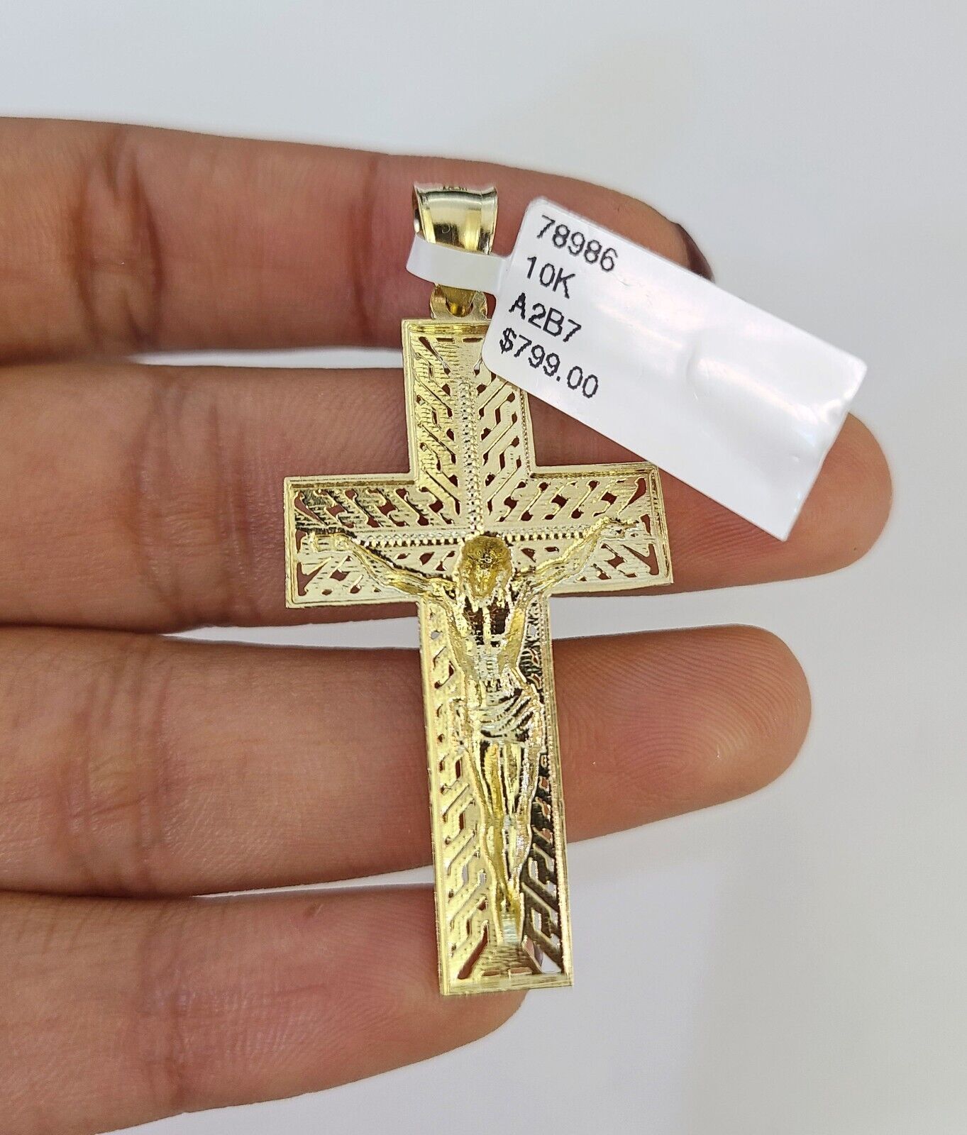 Front view of Jesus cross pendant necklace in 10K gold with Franco chain