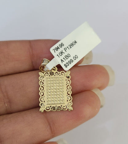 Initial pendant angled close-up