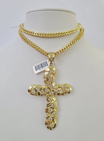 Side angle view of 10K yellow gold Jesus cross pendant on Franco chain