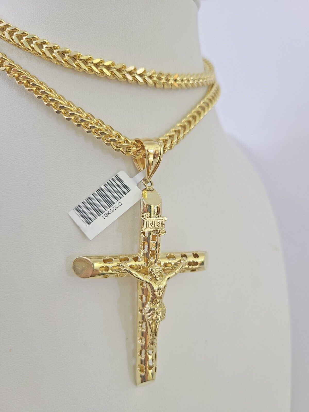 Side angle view of Franco chain necklace featuring INRI Jesus cross pendant charm