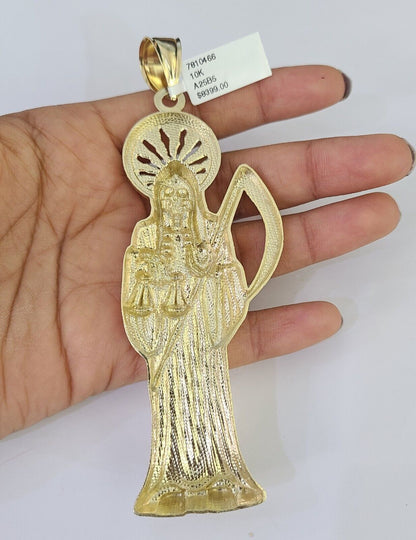 Front-facing view of Reva Jeweler 10K gold Saint Reaper pendant and chain