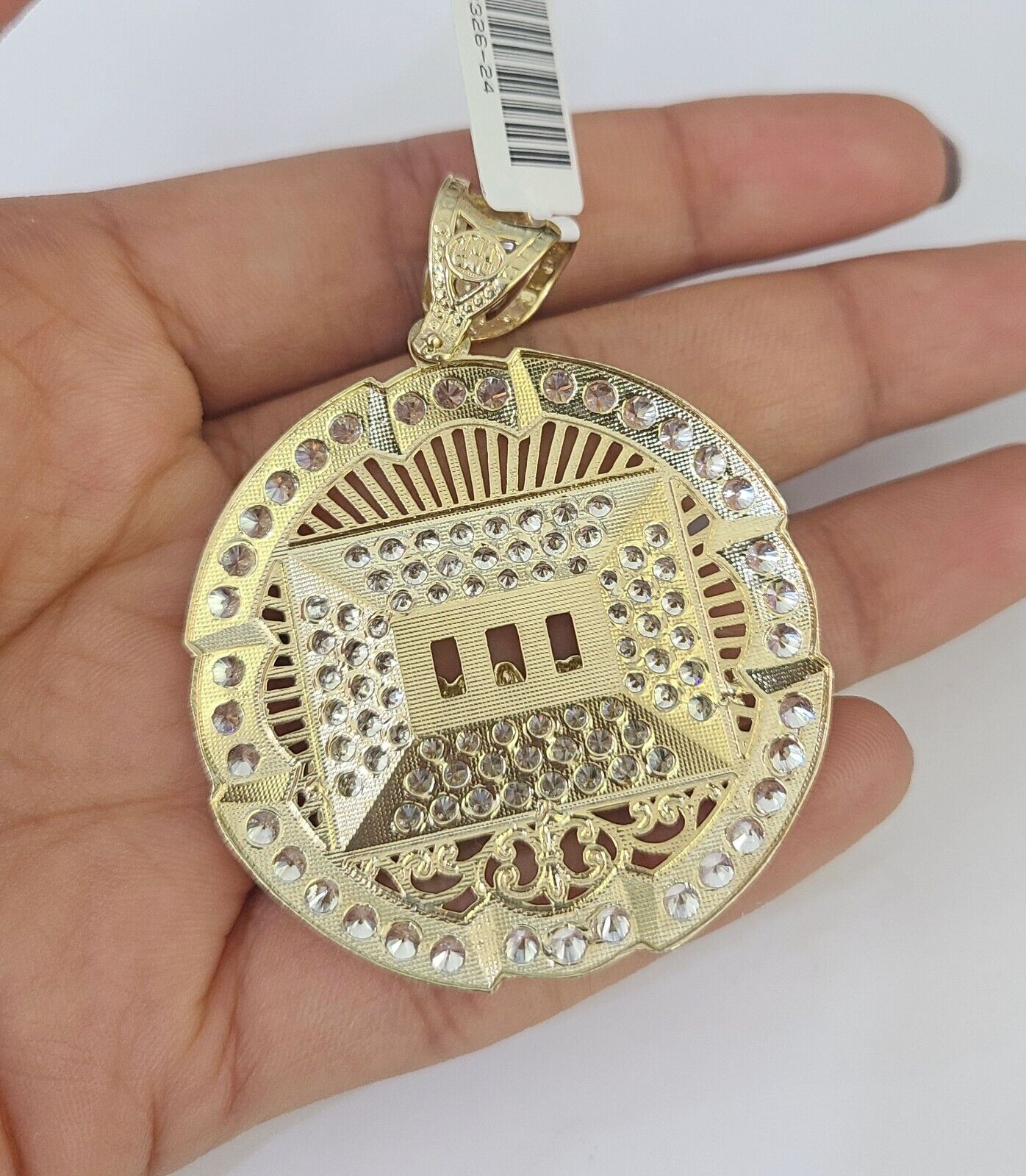 Close-up detailed view of 10K yellow gold Last Supper pendant charm