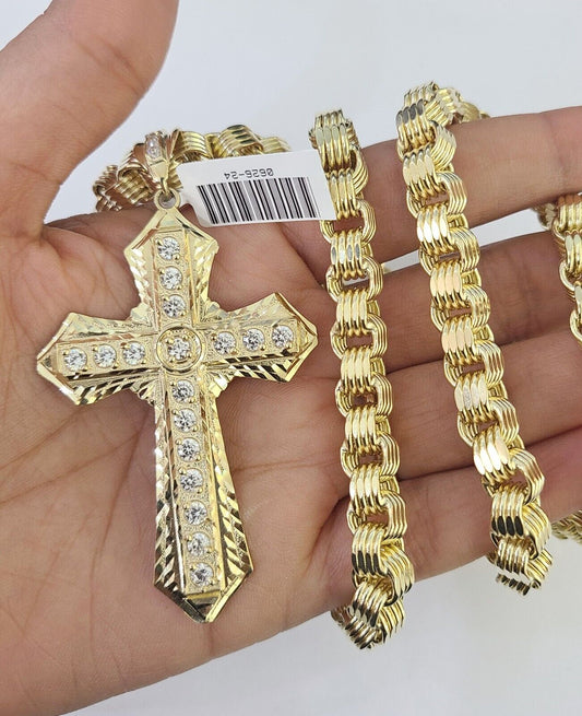 Full display of 10K gold 8mm Byzantine chain with Jesus cross pendant