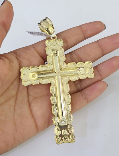 Close-up detailed view of 10K yellow gold Jesus cross pendant charm