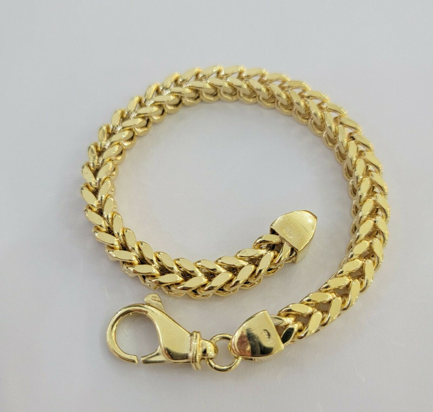 Men's 10k Gold Franco Bracelet 9" 7mm 10kt Yellow Gold Authentic 10kt MEN STRONG - Reva Jeweler