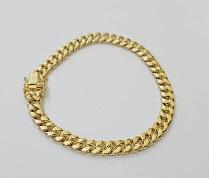 Real 10k Gold Bracelet 7 Inch 7mm Miami Cuban Link 10kt Yellow Gold For Women - Reva Jeweler