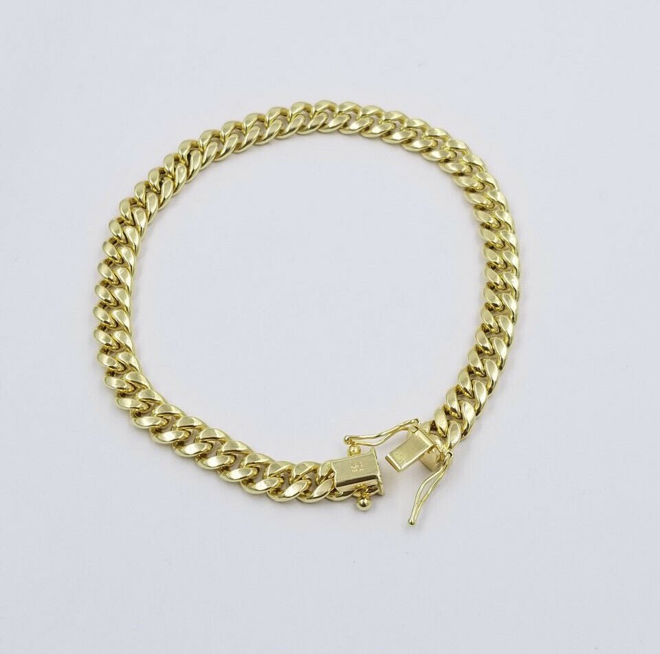 REAL 10k Gold Miami Cuban Bracelet 7" 6mm 10 kt Yellow Gold Strong Links LADIES - Reva Jeweler