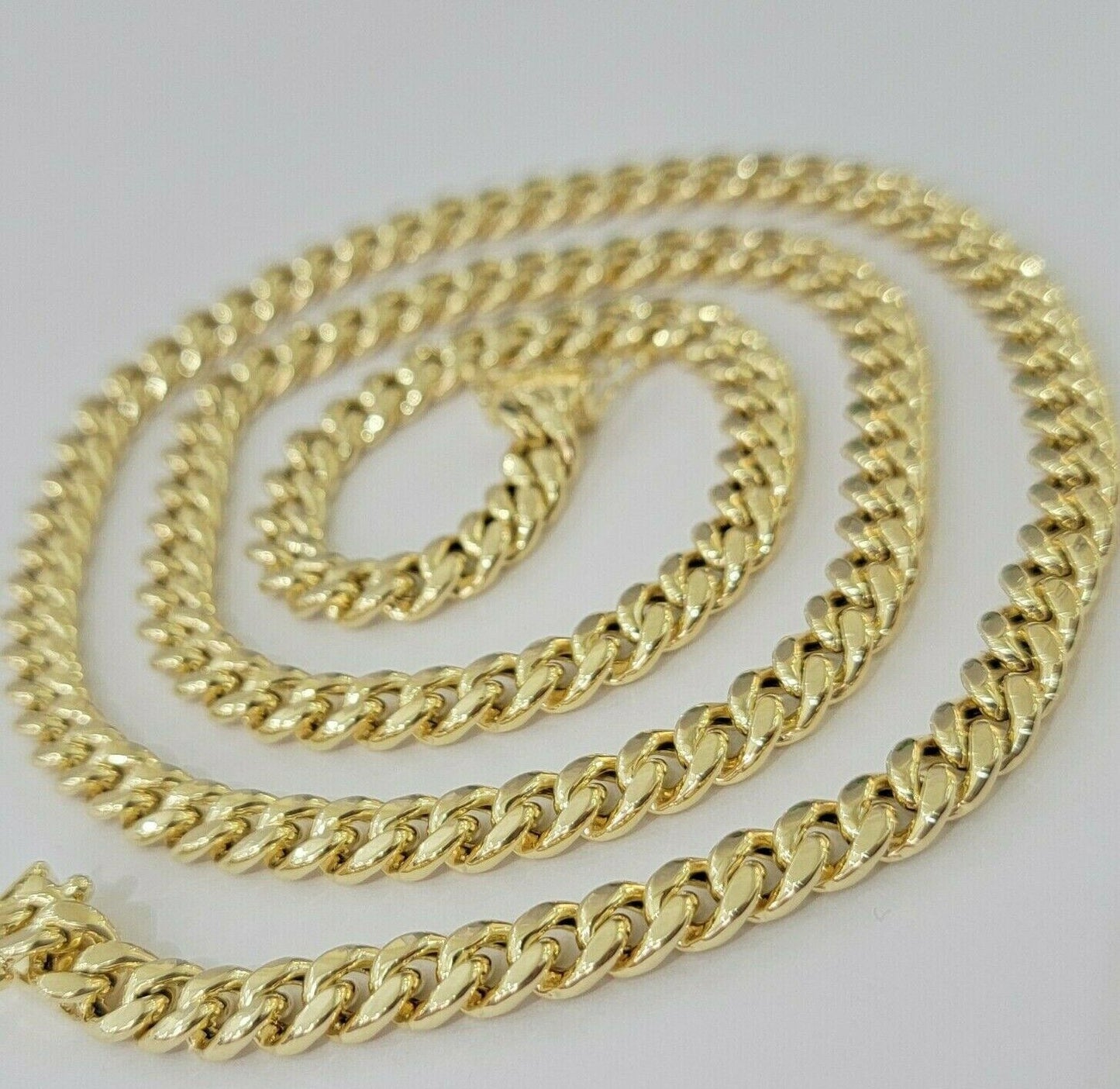 Real 10k Gold Miami Cuban chain 7mm 24" Lobster Lock Men's 10kt Yellow Gold, MEN - Reva Jeweler