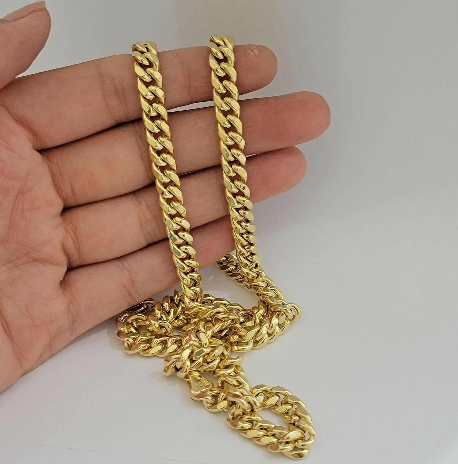 Real 10k Gold Miami Cuban chain 7mm 24" Lobster Lock Men's 10kt Yellow Gold, MEN - Reva Jeweler
